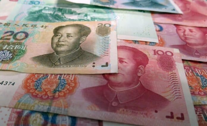 Čína hlásí první případ praní špinavých peněz CBDC