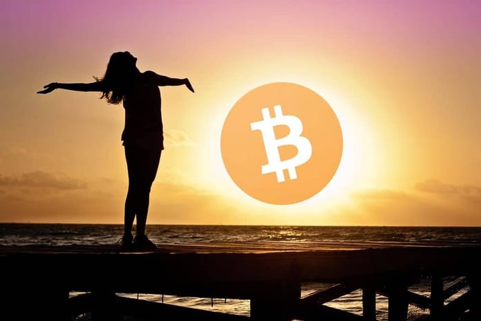 woman usvit optimismus svitani bitcoinu ordinals nft bitcoin